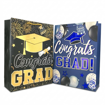 Two graduation-themed gift bags, one with a gold cap and diploma design and the other with a blue cap and balloons design, on a white background.
