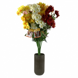 Multicolored violets flowers in a vase on a white background
