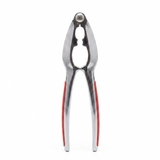 Metallic kitchen Nutcracker with red accents on a white background