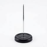 Black magnetic pin holder with a metal pin on a white background
