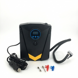 Black and yellow inflatable pump with accessories on a white background